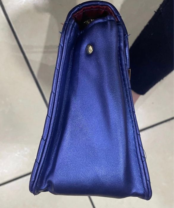 Mala azul metalizada ysl