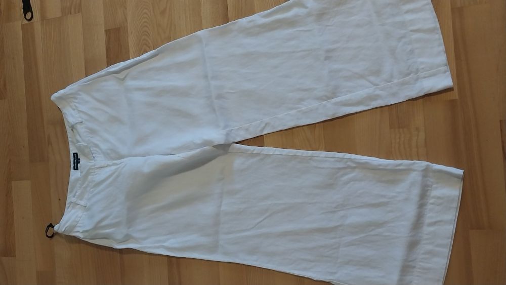 Продам  женские белые льняные штаны  Warehouse  оригинальные.