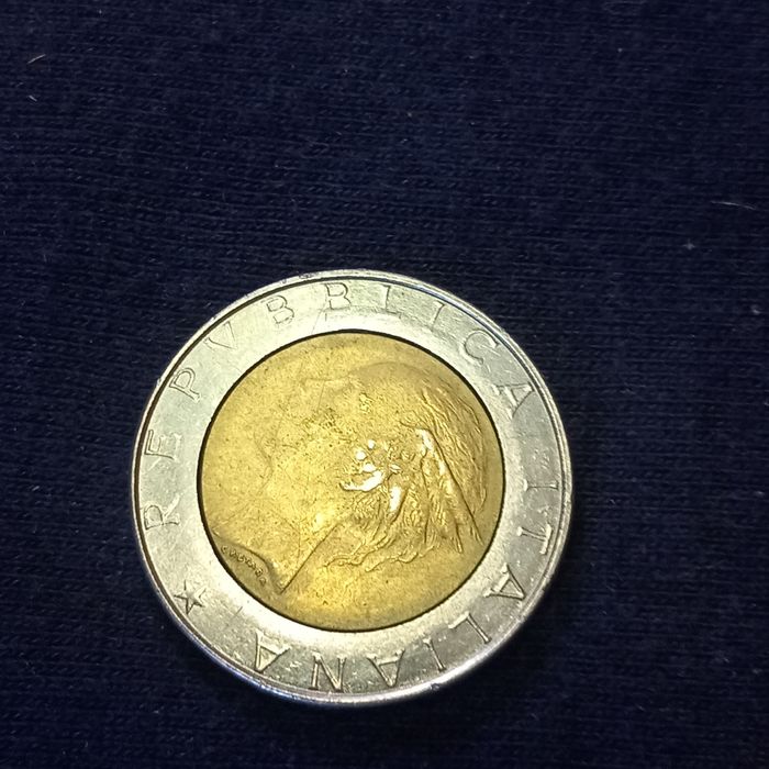 Moedas dólar Canadá e liras Itália