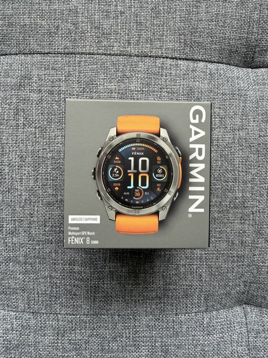 Nowy Garmin fēnix® 8 — 51 mm, AMOLED Sapphire Sapphire, Tytanowy z paskiem silikonowym w kolorze Spark orange / Graphite