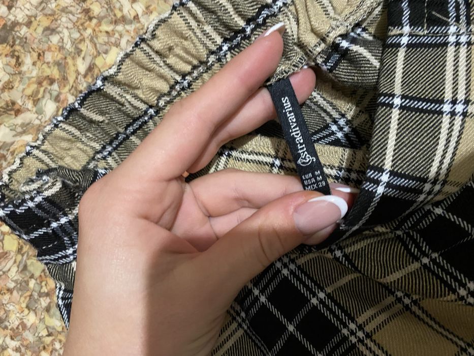 Штани на кнопках фірми Stradivarius