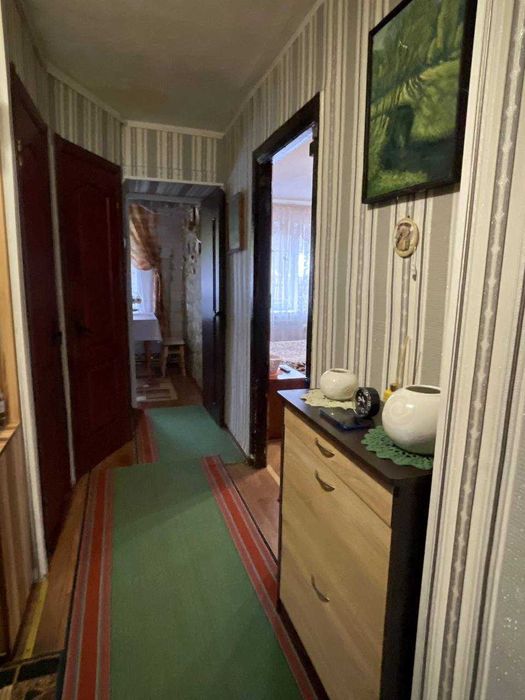 У Центрі селища Буди шикарна 3 кімн. квартира з капітальним ремонтом.