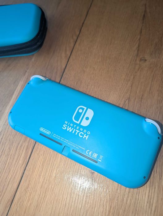 Nintendo Switch Lite (Блакитна) + Чохол