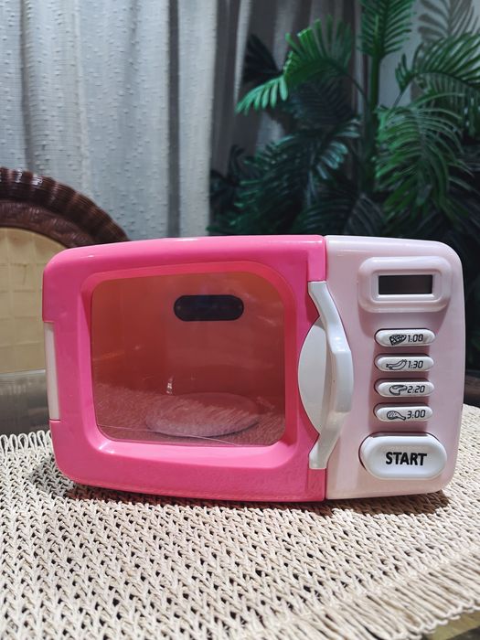 Microondas cor de rosa de brincar