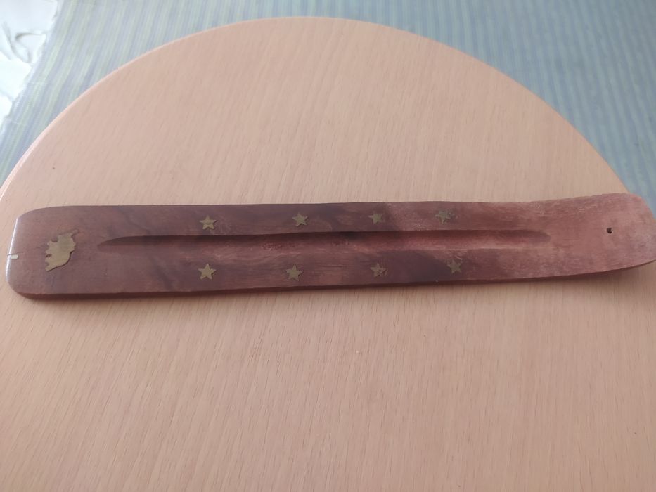 Suporte para insenso em madeira com estrelas e elefante dourado