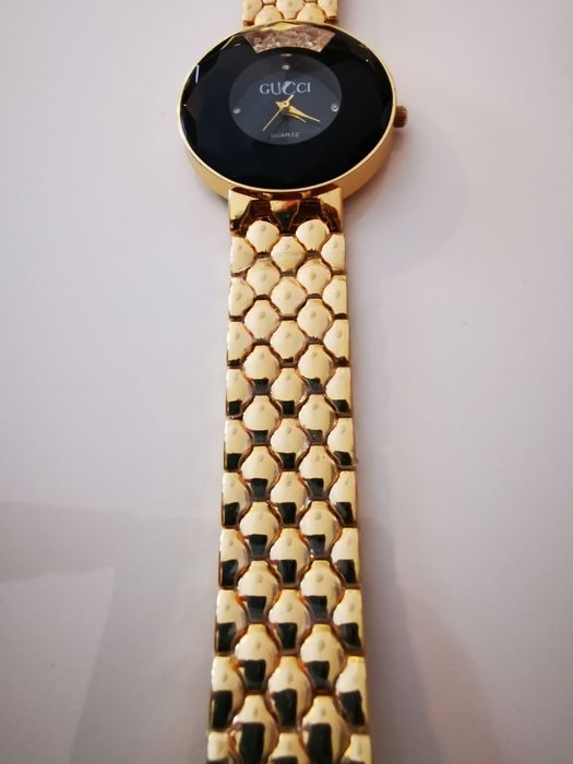 Zegarek złota bransoleta Gucci