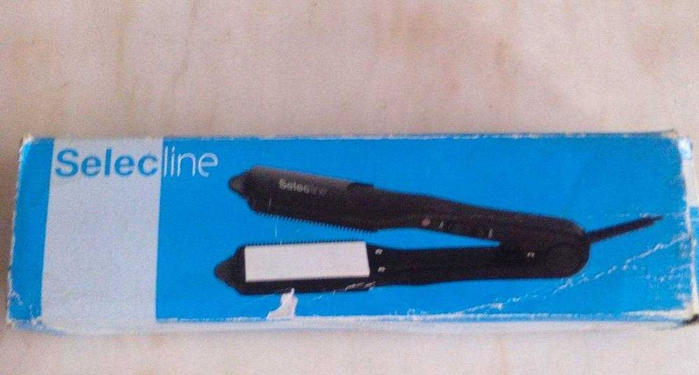 Alisador de cabelo como novo na caixa vendo ou troco