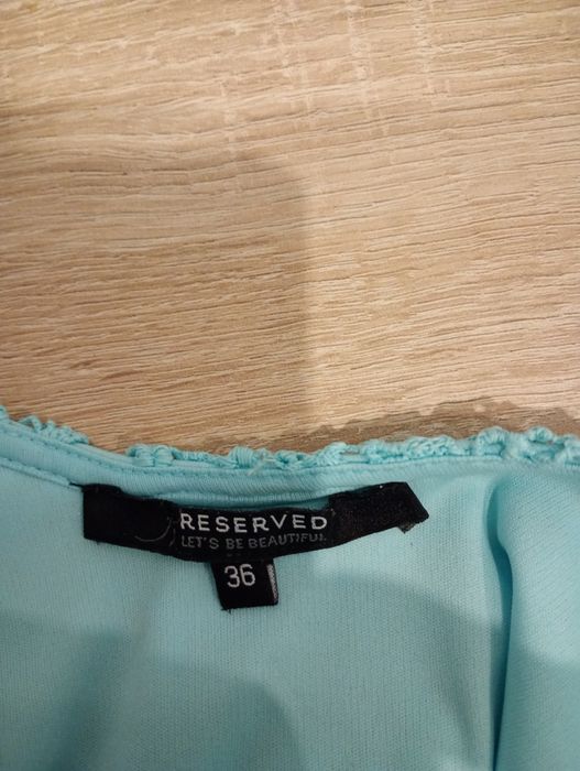Miętowa sukienka Reserved rozmiar 36, stan idealny