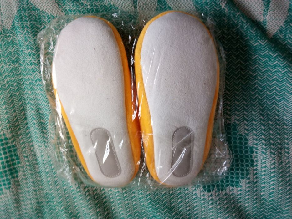 Нові дитячі тапочки