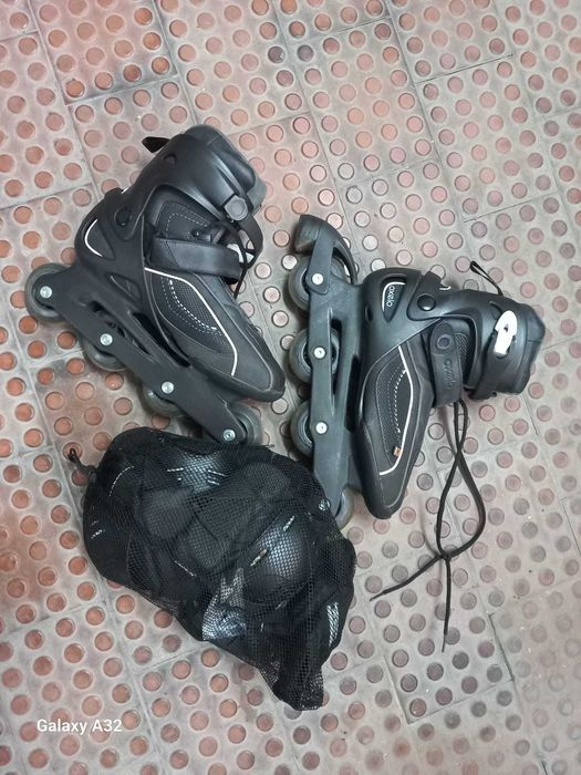 Patins Oxelo número 42 + proteções