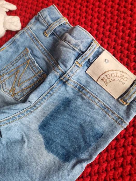NUCLEO jeansy z streczem wakacyjne wzory 74-80 cm 9-12m.