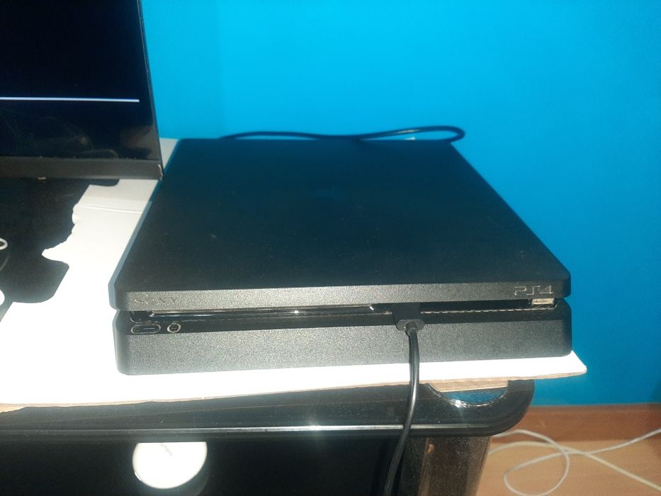 Ps4 com Comandos jogos e base para carregar