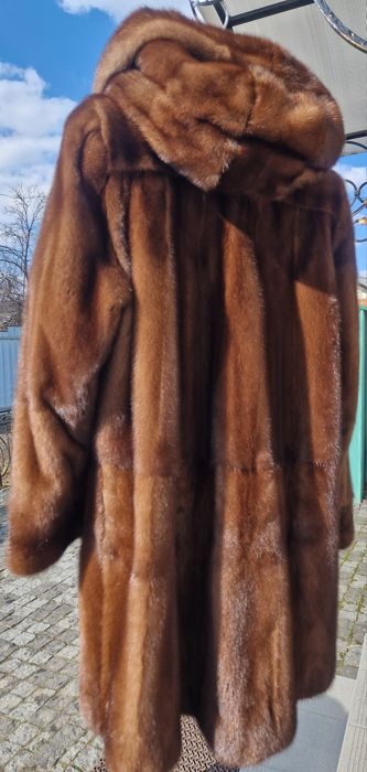 Норкова шуба нова