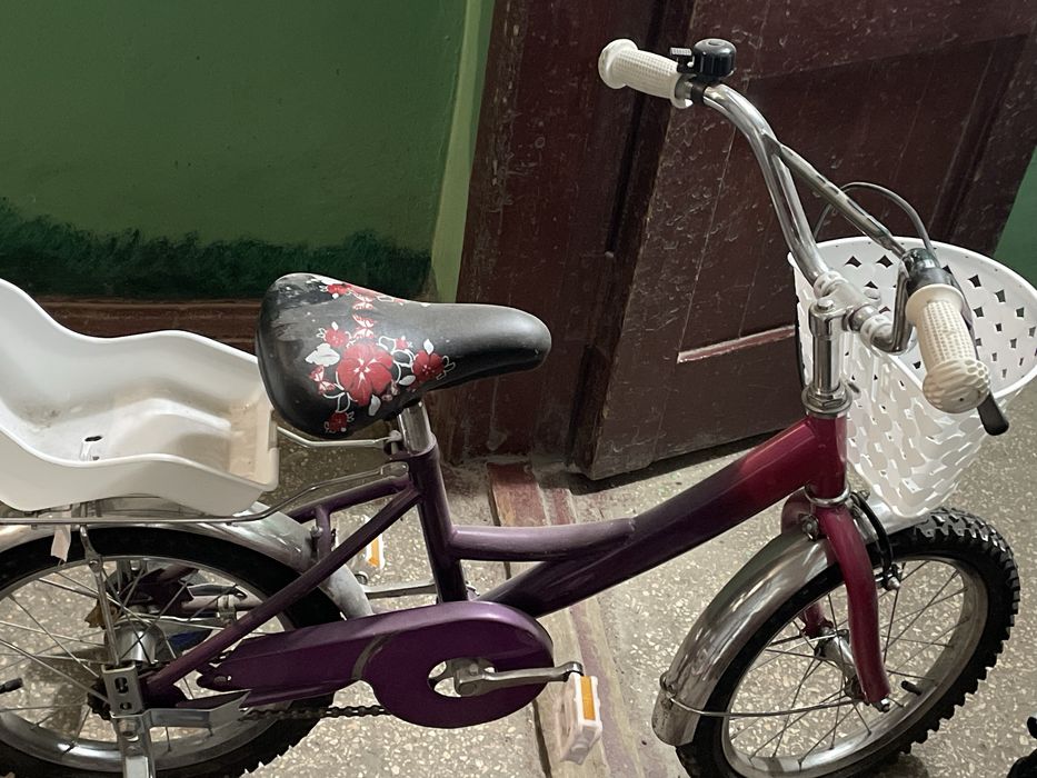 Дитячий велосопед і самокат