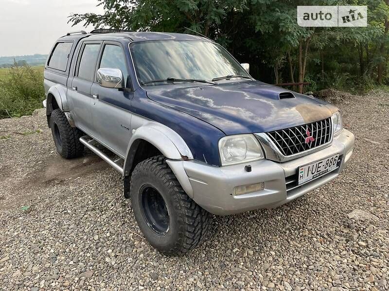 Скло Mitsubishi l200 2.5 разборка л200