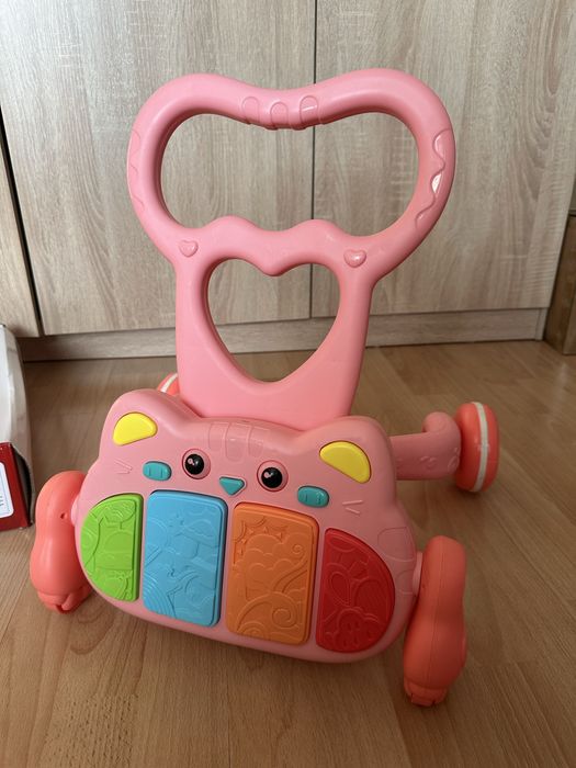 Килимок толокар 2в1  рожевий,  піаніно 3м+ є коробка гарний стан