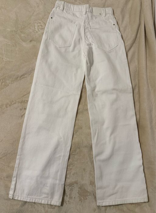Jeansy białe nowe