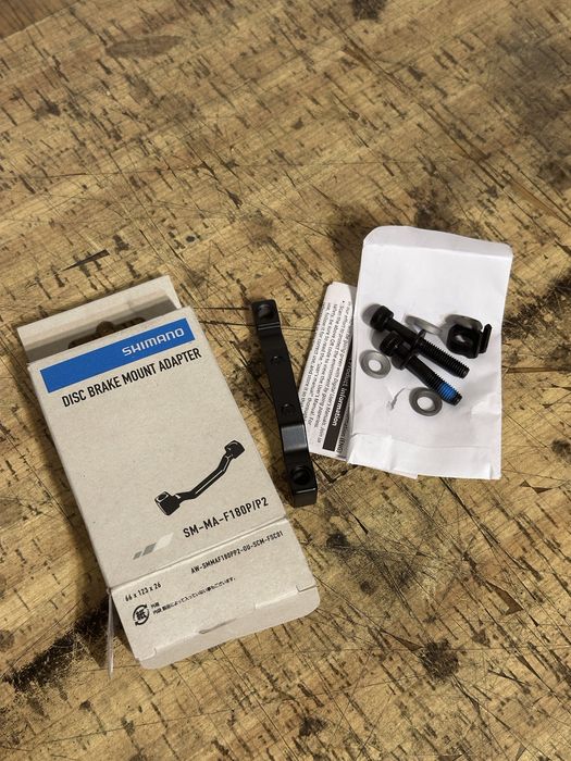 Adapter hamulcowy Shimano SM-MA 180mm P/S – nowy