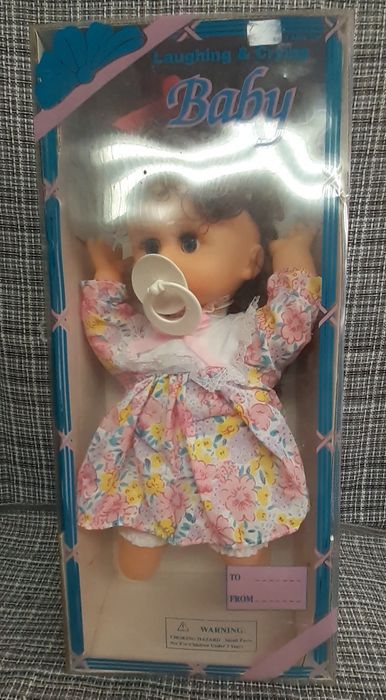 Boneca nova em caixa