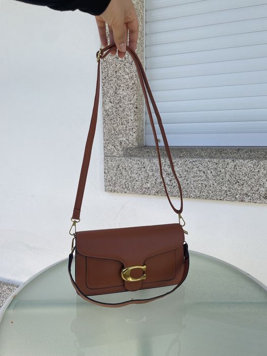 Mala camel e dourada