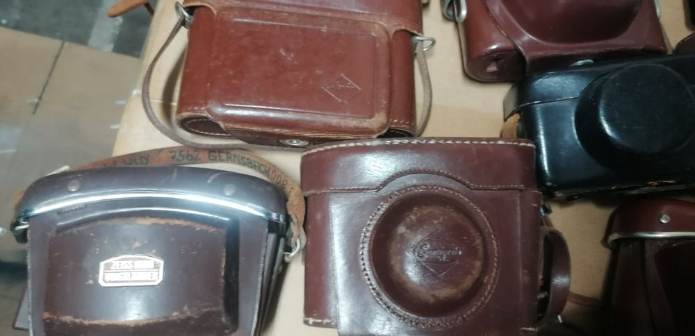Conjunto bolsas couro máquinas fotográficas
