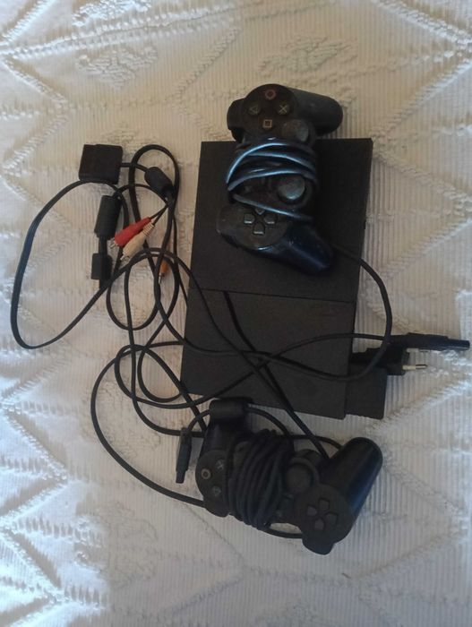 Vendo PS2 Slim com dois comandos