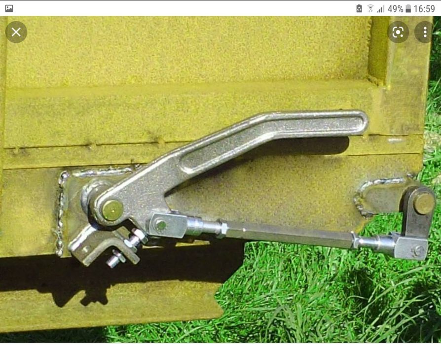 Ручка відкривання борта причепа, самоскида