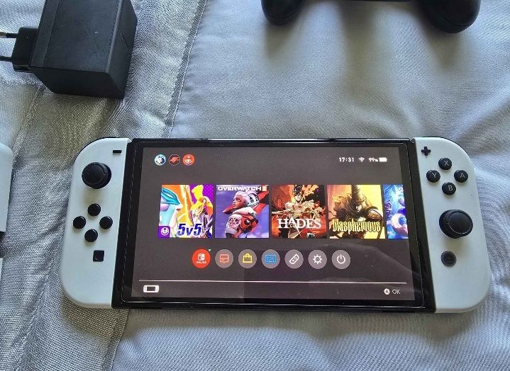 fantástico kit Nintendo Switch OLED, que está em excelente estado de conservação, conforme pode verificar pelas imagens reais