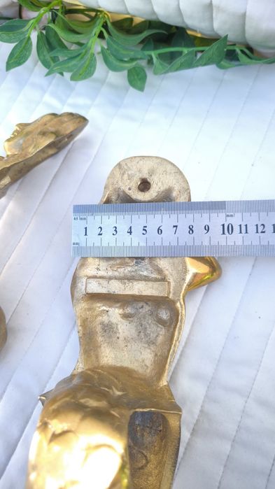Продам бронзові чи латуні кріплення для карнизу..Масивні.Русалки
