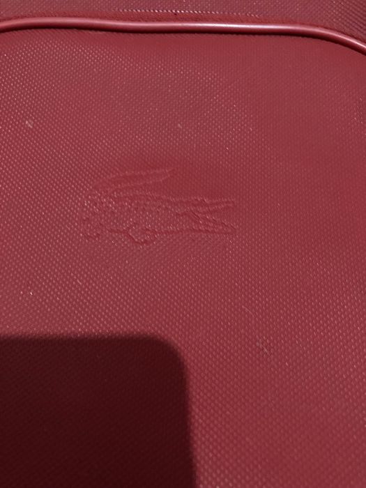 Malas lacoste vermelhas