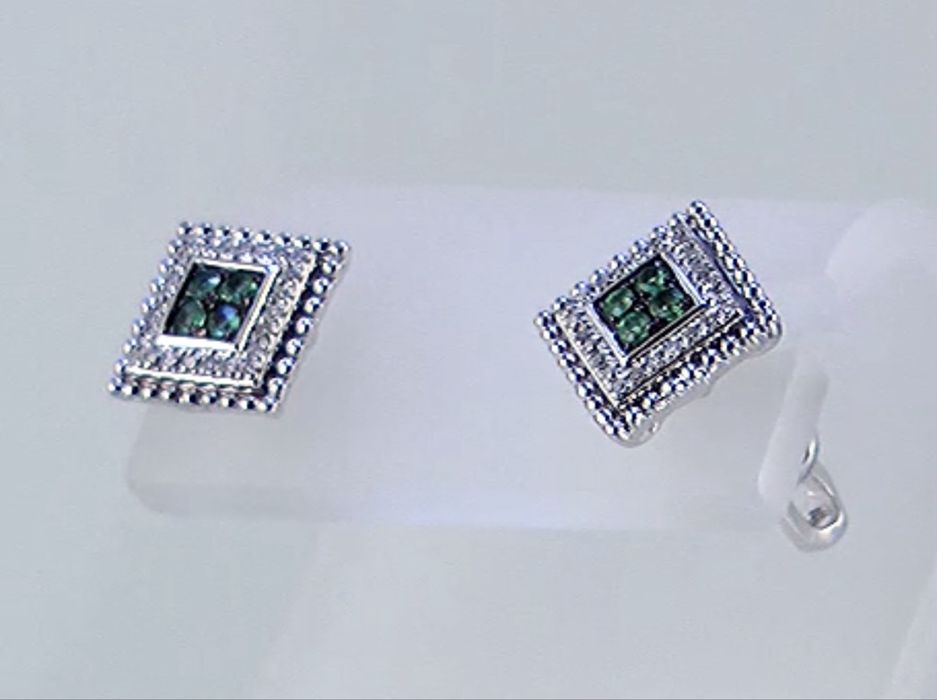 Прекрасные золотые серьги с бриллиантами и изумрудами