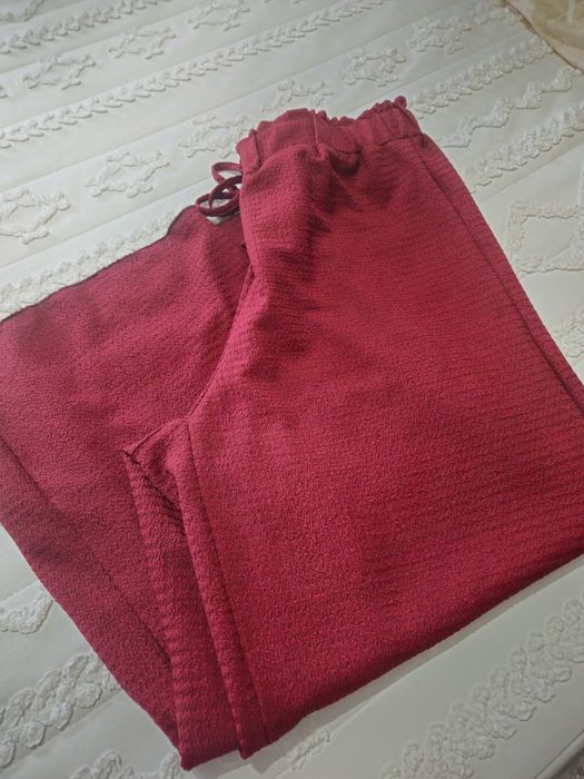 Calça pantalona.