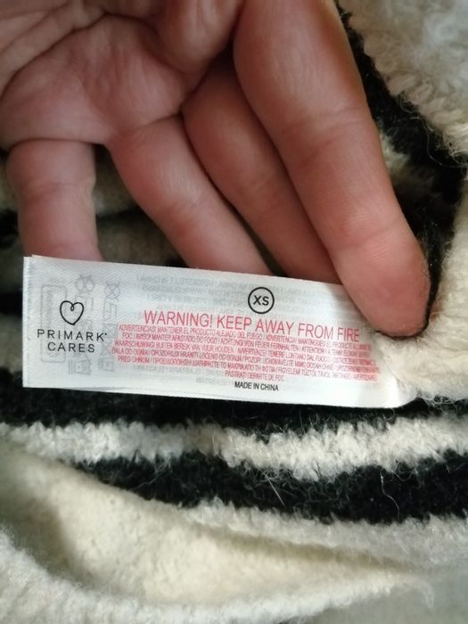 Шерстяний светр в смужки