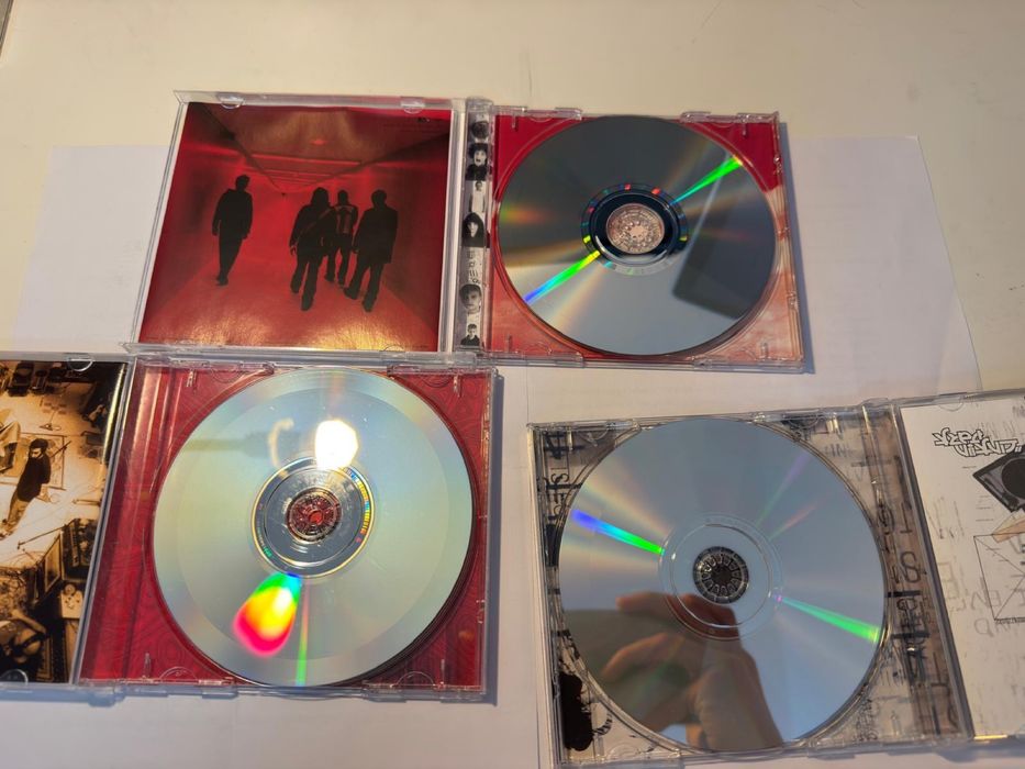 Discman + 3 cd.