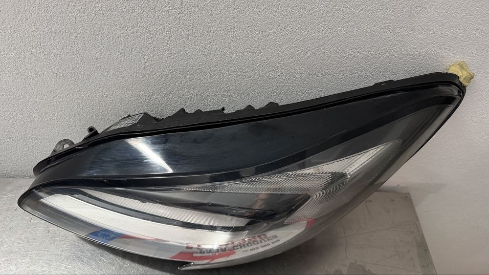 Farol esq opel corsa E 2014/2019