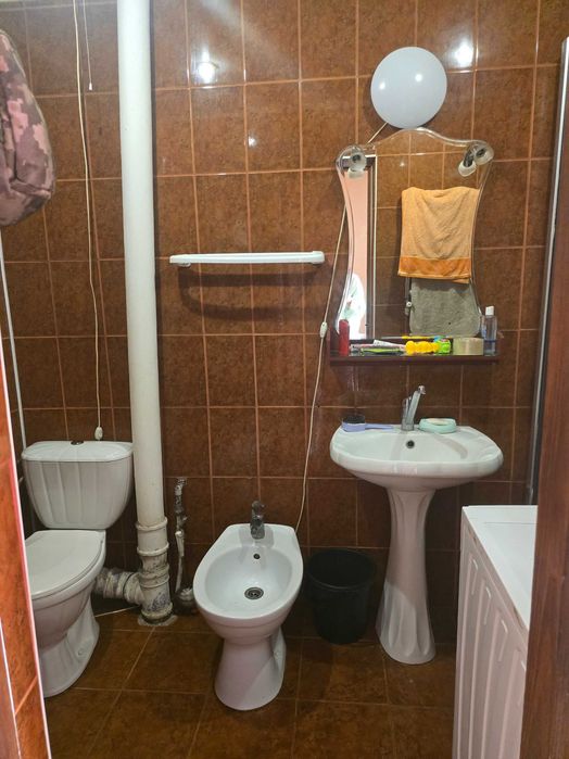 Продається 2-кімнатна квартира з ділянкою, гаражем та господарськими будівлями (м. Гайсин)