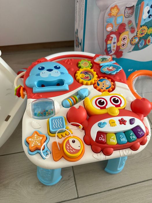 Дитячі ходунки каталка столик