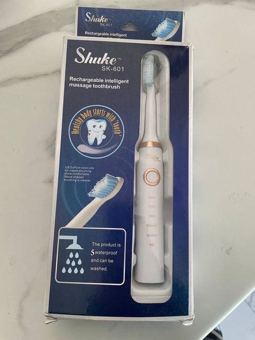 Електрична зубна щітка