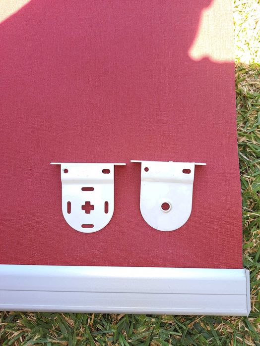 2 cortinados de rolo.