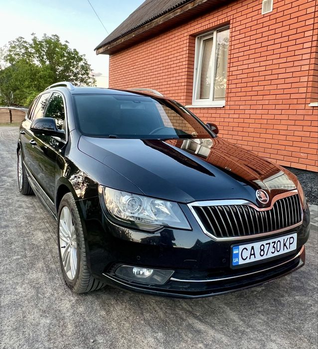 Skoda Superb 2014 VIN TMBJF63T1F9013081 фото оголошення 2 з 24