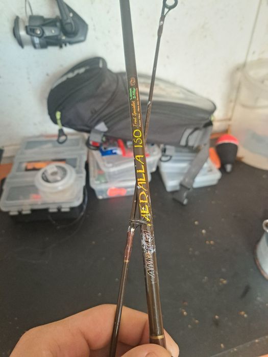 Conjunto pesca boia e medalha