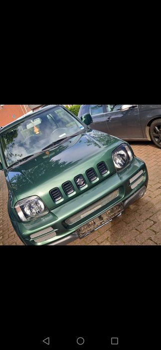 Suzuki Jimni 1.3 benz,super stan,hak,85 tys km