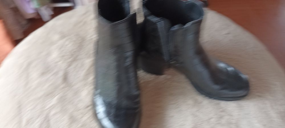 Botas praticamente novas