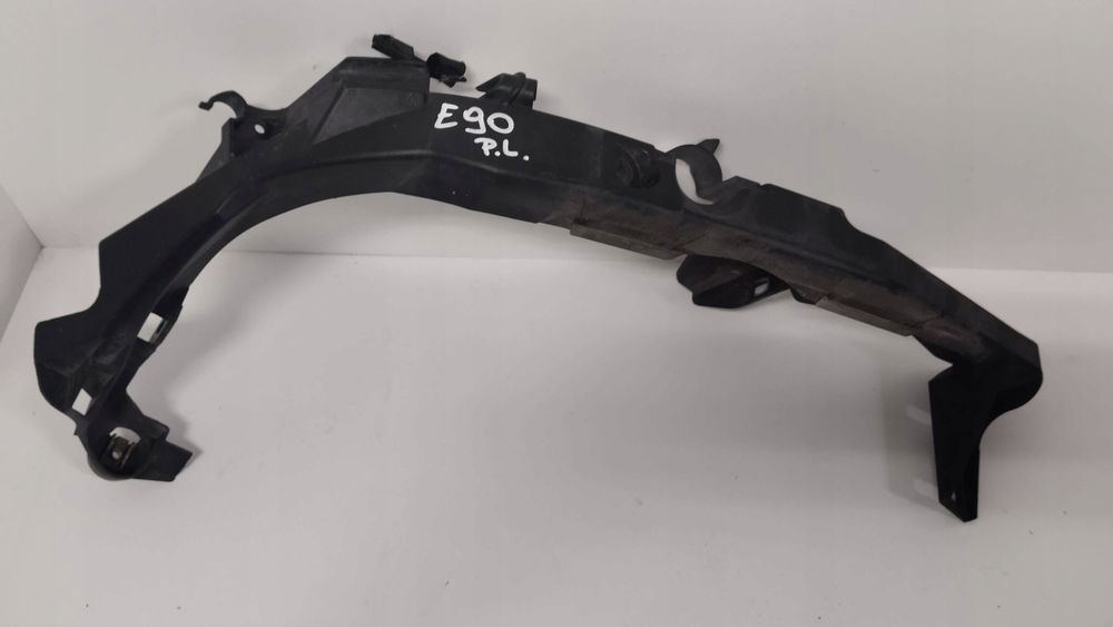 ślizg uchwyt lewy lampy przód przedniej lewej bmw e90 e91 7116707