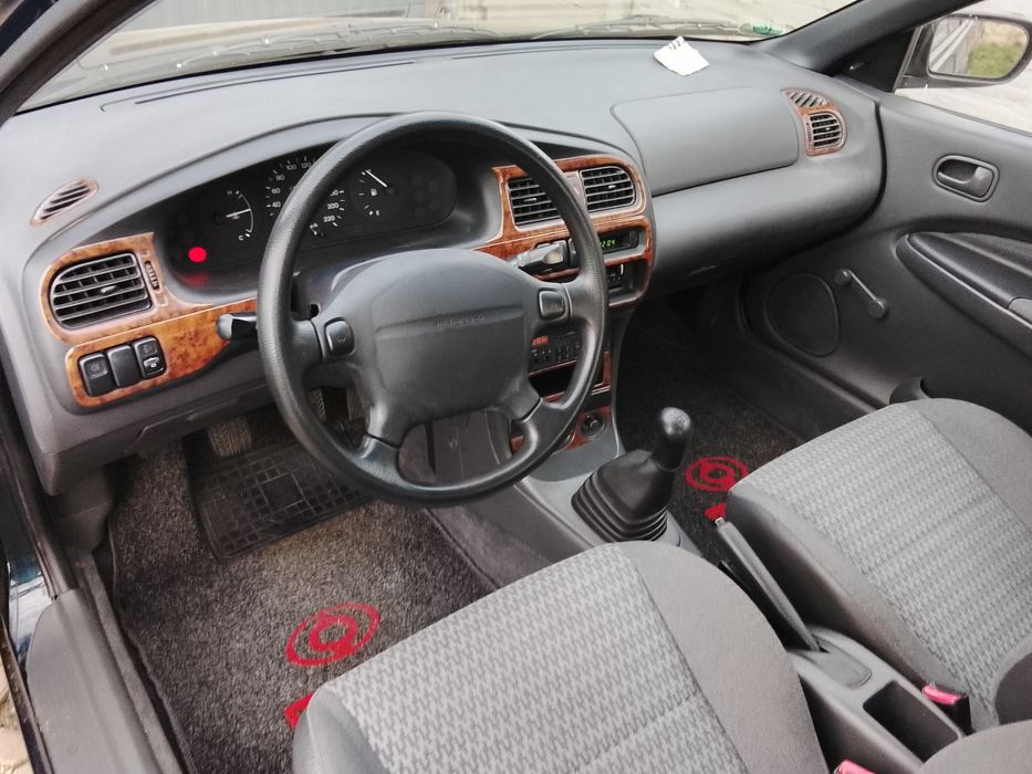 Mazda 323 sedan igła stan idealny perfekcyjny top 60 tys km