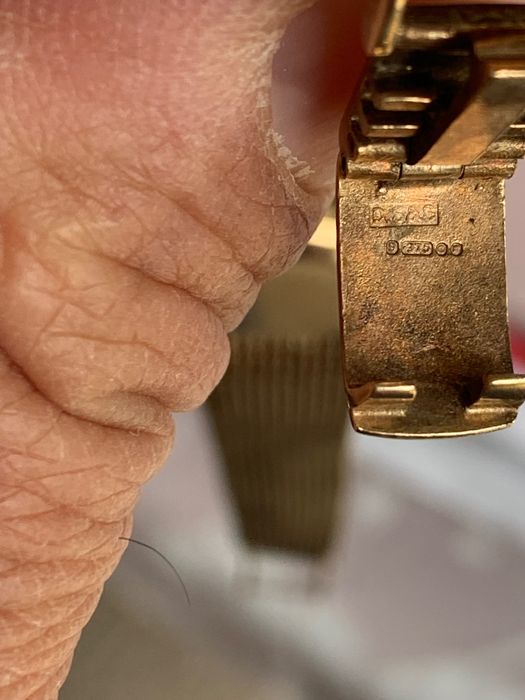 Годинник, золотий омега