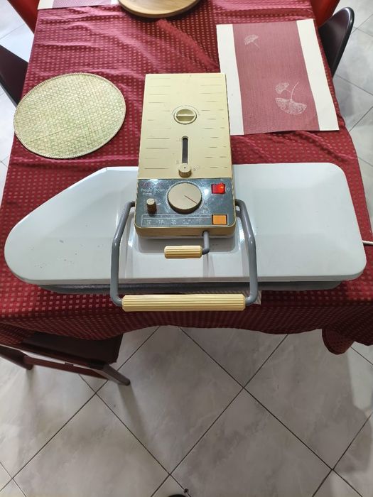 Máquina de passar roupa a vapor Singer