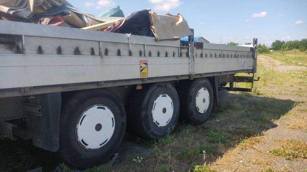 Напівпричіп Schmitz S01 бортовий 2003 | Schmitz Cargobull | Тентований напівпричіп