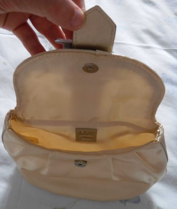 Pochete dourada, Dior, nova