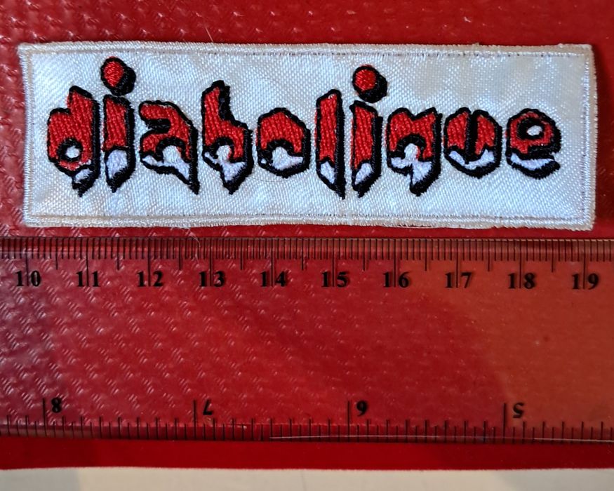 Diabolique, emblema de pano, 9 cm. x 3 cm.
